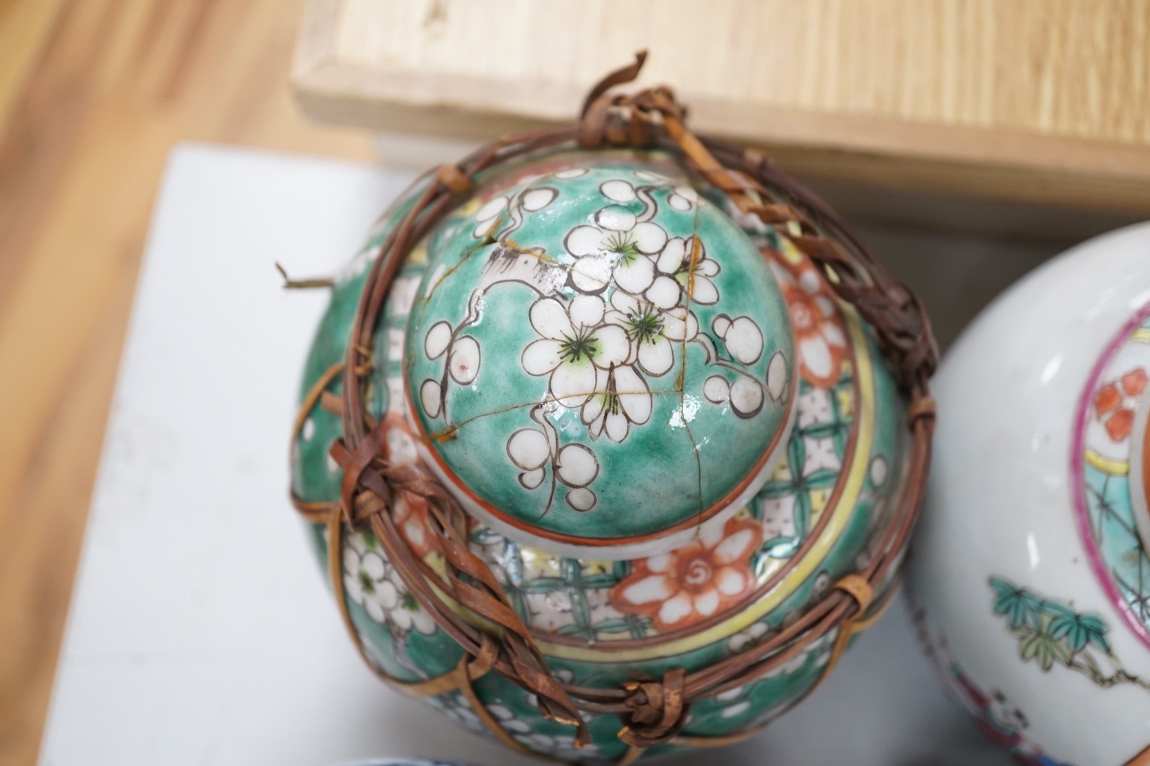 A collection of 19th and 20th century Chinese jars and covers and a blue and white vase and cover, vase 32cms high